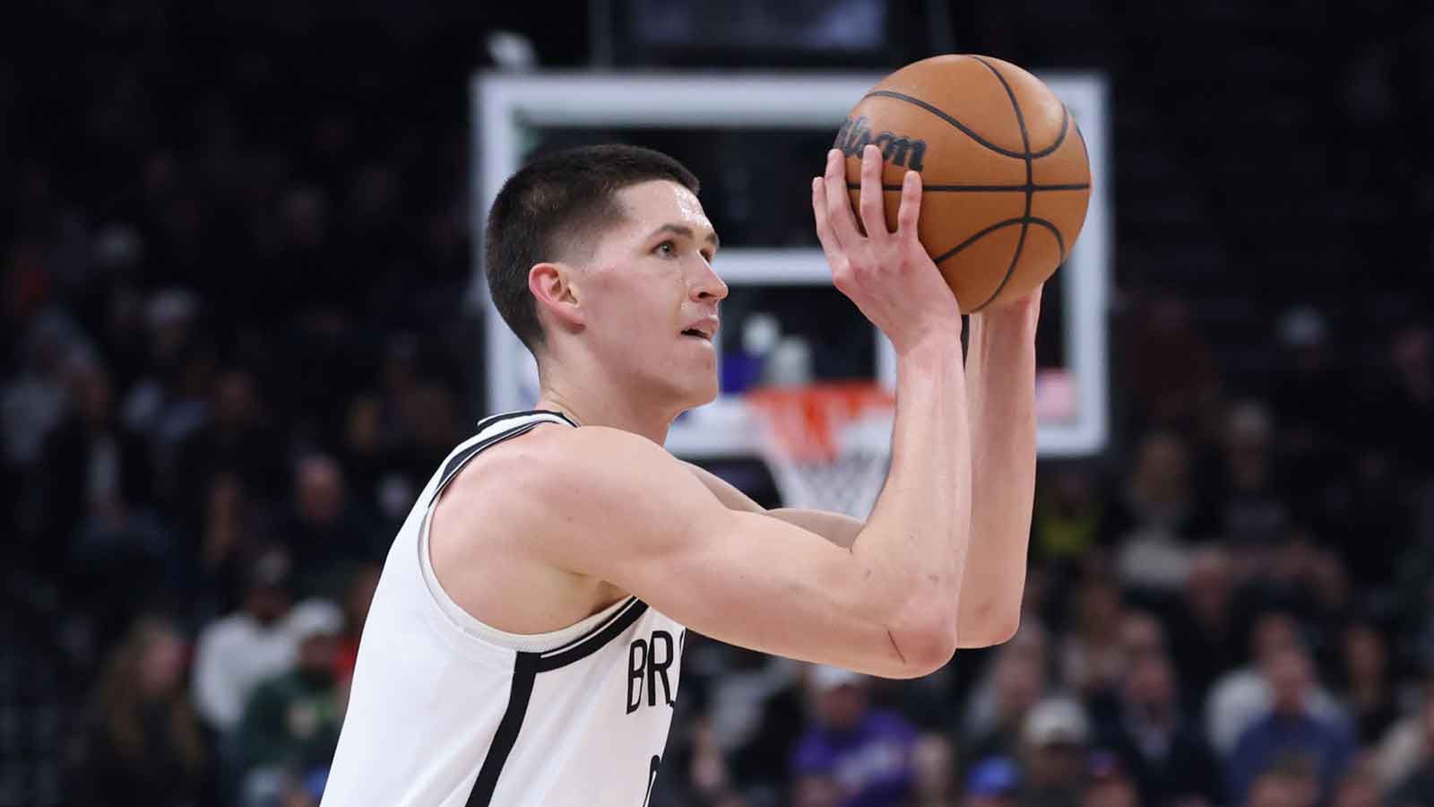 Brooklyn Nets guard Egor Demin (8) shoots a three point basket against the Utah Jazz during the first half at Delta Center.