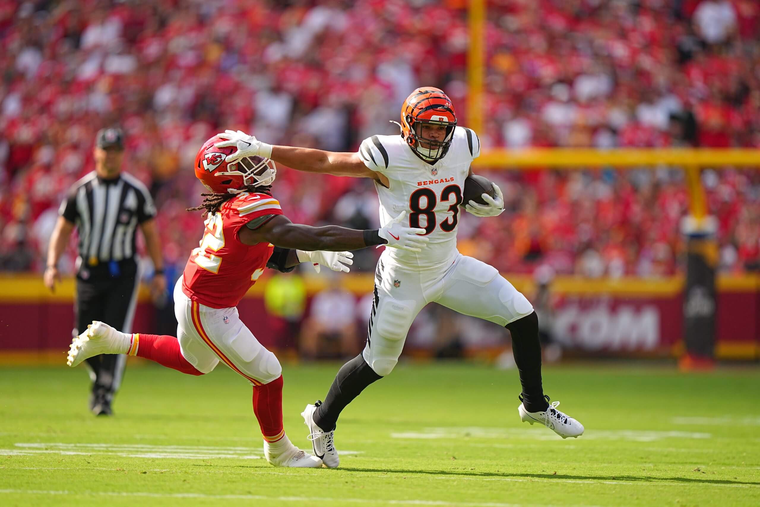 Cincinnati Bengals tight end Erick All Jr. stiff arms a defender versus the Kansas City Chiefs at Arrowhead Stadium in 2024.