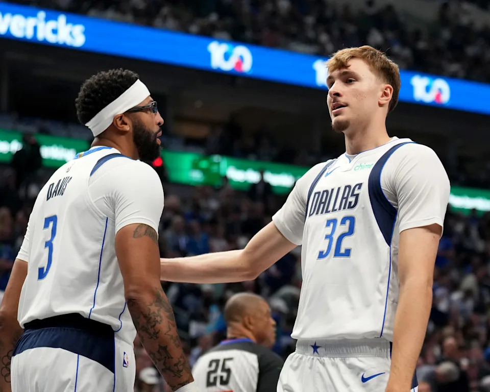 DALLAS, TX - OCTOBER 22: Anthony Davis #3 and Cooper Flagg #32 of the Dallas Mavericks talk during the game against the San Antonio Spurs on October 22, 2025 at American Airlines Center in Dallas, Texas. NOTE TO USER: User expressly acknowledges and agrees that, by downloading and or using this photograph, User is consenting to the terms and conditions of the Getty Images License Agreement. Mandatory Copyright Notice: Copyright 2025 NBAE (Photo by Jesse D. Garrabrant/NBAE via Getty Images)