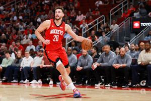 HOUSTON, TEXAS - OCTOBER 27: Alperen Sengun #28 of the Houston Rockets drives the ball in the second half of the game against the Brooklyn Nets at Toyota Center on October 27, 2025 in Houston, Texas. (Photo by Kenneth Richmond/Getty Images