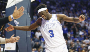 PROVO, UT - NOVEMBER 11: AJ Dybantsa #3 of the Brigham Young Cougars celebrates a score with fans during the second half of their game against the Delaware Blue Hens at the Marriott Center on November 11, 2025 in Provo, Utah. (Photo by Chris Gardner/Getty Images)
