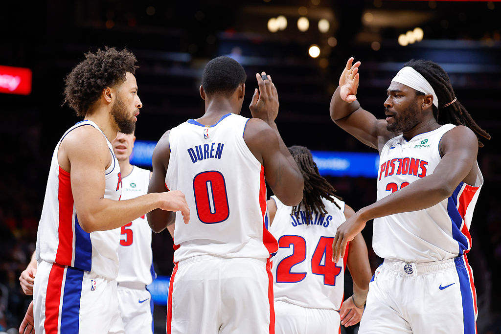 ATLANTA, GEORGIA - NOVEMBER 18: Cade Cunningham #2, Jalen Duren #0 and Isaiah Stewart #28 of the Detroit Pistons react during the first quarter against the Atlanta Hawks at State Farm Arena on November 18, 2025 in Atlanta, Georgia. NOTE TO USER: User expressly acknowledges and agrees that, by downloading and or using this photograph, User is consenting to the terms and conditions of the Getty Images License Agreement. (Photo by Todd Kirkland/Getty Images)