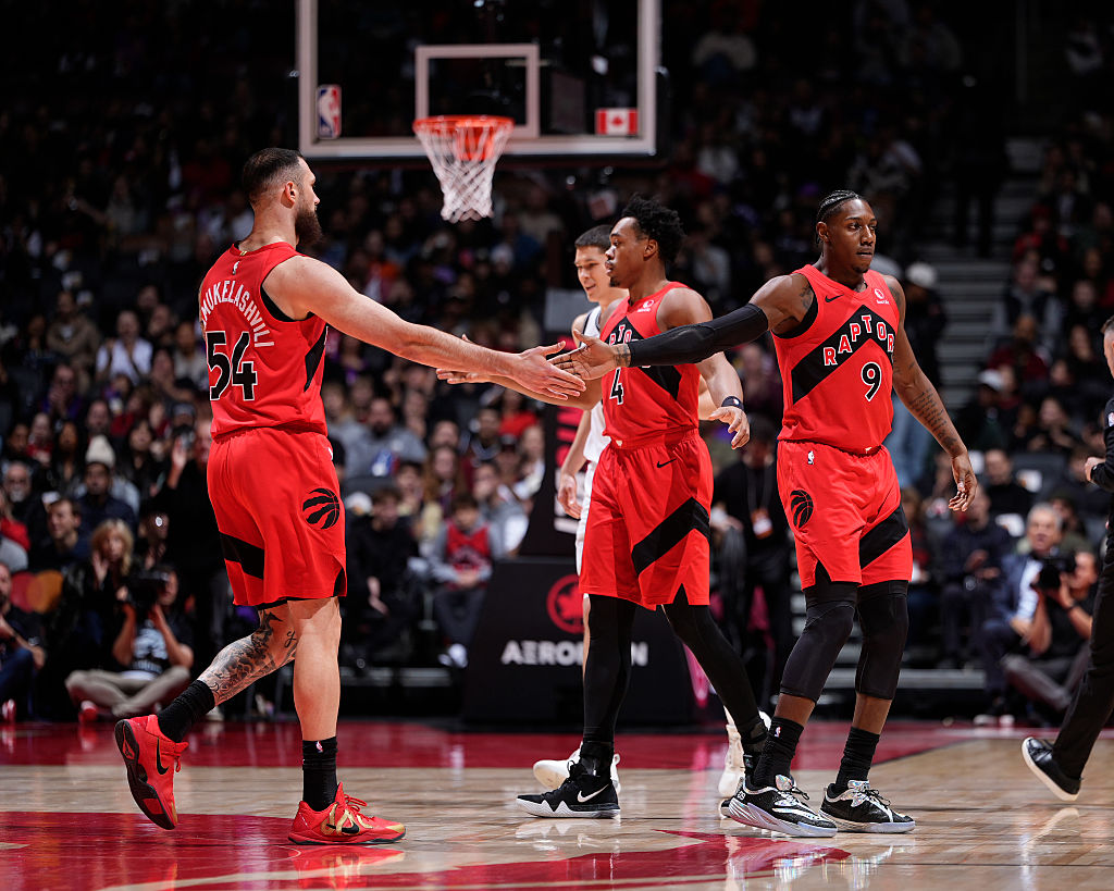 TORONTO, CANADA - NOVEMBER 23: Sandro Mamukelashvili #54 and RJ Barrett #9 of the Toronto Raptors high five during the game against the Brooklyn Nets on November 23, 2025 at the Scotiabank Arena in Toronto, Ontario, Canada. NOTE TO USER: User expressly acknowledges and agrees that, by downloading and or using this Photograph, user is consenting to the terms and conditions of the Getty Images License Agreement. Mandatory Copyright Notice: Copyright 2025 NBAE (Photo by Mark Blinch/NBAE via Getty Images)