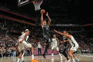 BROOKLYN, NY - DECEMBER 14: Michael Porter Jr. #17 of the Brooklyn Nets drives to the basket during the game against the Milwaukee Bucks on December 14, 2025 at Barclays Center in Brooklyn, New York. NOTE TO USER: User expressly acknowledges and agrees that, by downloading and or using this Photograph, user is consenting to the terms and conditions of the Getty Images License Agreement. Mandatory Copyright Notice: Copyright 2025 NBAE (Photo by Jesse D. Garrabrant/NBAE via Getty Images)