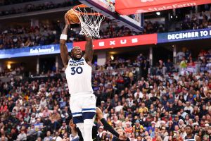DENVER, COLORADO - DECEMBER 25: Julius Randle #30 of the Minnesota Timberwolves drives to the basket against the Denver Nuggets in the third quarter at Ball Arena on December 25, 2025 in Denver, Colorado.