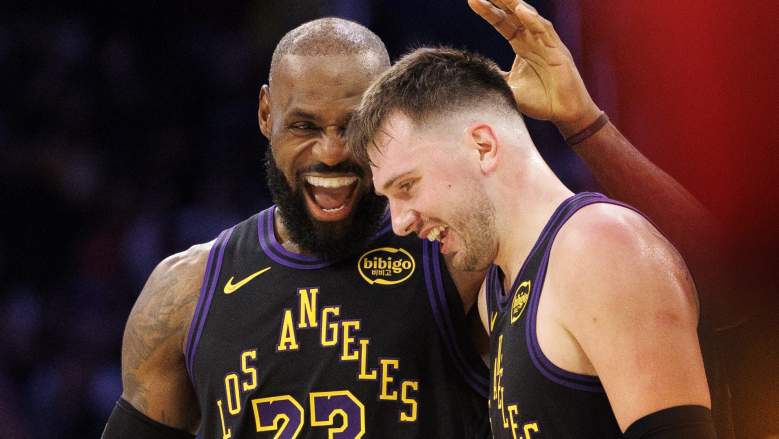 Lakers LeBron James reacts with Luka Doncic (77)