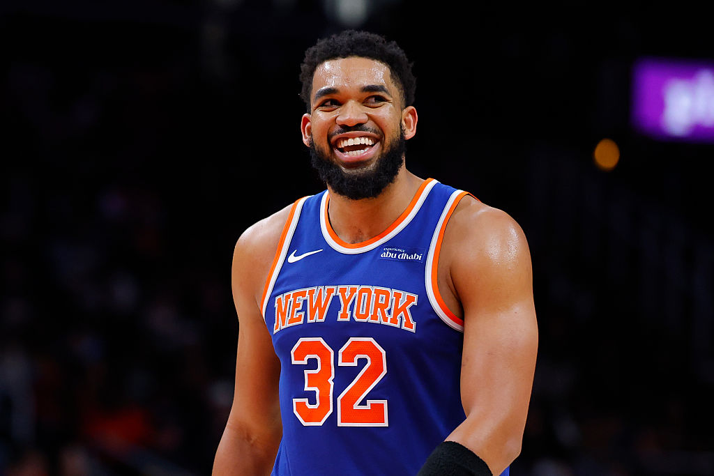 ATLANTA, GEORGIA - DECEMBER 27: Karl-Anthony Towns #32 of the New York Knicks reacts after a three-pointer during the fourth quarter against the Atlanta Hawks at State Farm Arena on December 27, 2025 in Atlanta, Georgia. NOTE TO USER: User expressly acknowledges and agrees that, by downloading and or using this photograph, User is consenting to the terms and conditions of the Getty Images License Agreement. (Photo by Todd Kirkland/Getty Images)