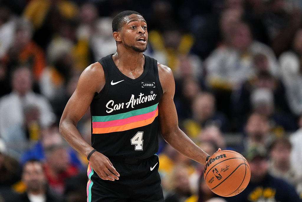 INDIANAPOLIS, INDIANA - JANUARY 02: De'Aaron Fox #4 of the San Antonio Spurs dribbles the ball in the second quarter against the Indiana Pacers at Gainbridge Fieldhouse on January 02, 2026 in Indianapolis, Indiana. NOTE TO USER: User expressly acknowledges and agrees that, by downloading and or using this photograph, User is consenting to the terms and conditions of the Getty Images License Agreement. (Photo by Dylan Buell/Getty Images)
