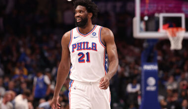 DALLAS, TEXAS - JANUARY 01: Joel Embiid #21 of the Philadelphia 76ers looks on during the second half against the Dallas Mavericks at American Airlines Center on January 01, 2026 in Dallas, Texas. NOTE TO USER: User expressly acknowledges and agrees that, by downloading and or using this photograph, user is consenting to the terms and conditions of the Getty Images License Agreement. (Photo by Sam Hodde/Getty Images)