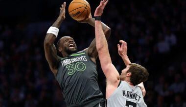MINNEAPOLIS, MINNESOTA - JANUARY 11: Julius Randle #30 of the Minnesota Timberwolves shoots against Luke Kornet #7 of the San Antonio Spurs in the first quarter at Target Center on January 11, 2026 in Minneapolis, Minnesota.