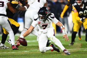 PITTSBURGH, PENNSYLVANIA - JANUARY 12: C.J. Stroud #7 of the Houston Texans fumbles in the third quarter of an NFL wild card playoff game against the Pittsburgh Steelers at Acrisure Stadium on January 12, 2026 in Pittsburgh, Pennsylvania. (Photo by Joe Sargent/Getty Images)