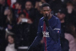 Paris Saint-Germain's French forward #10 Ousmane Dembele gestures as he celebrates after scoring Paris Saint-Germain's second goal during the French L1 football match between Paris Saint-Germain (PSG) and Lille LOSC at the Parc des Princes stadium in Paris on January 16, 2026. (Photo by Anne-Christine POUJOULAT / AFP via Getty Images)