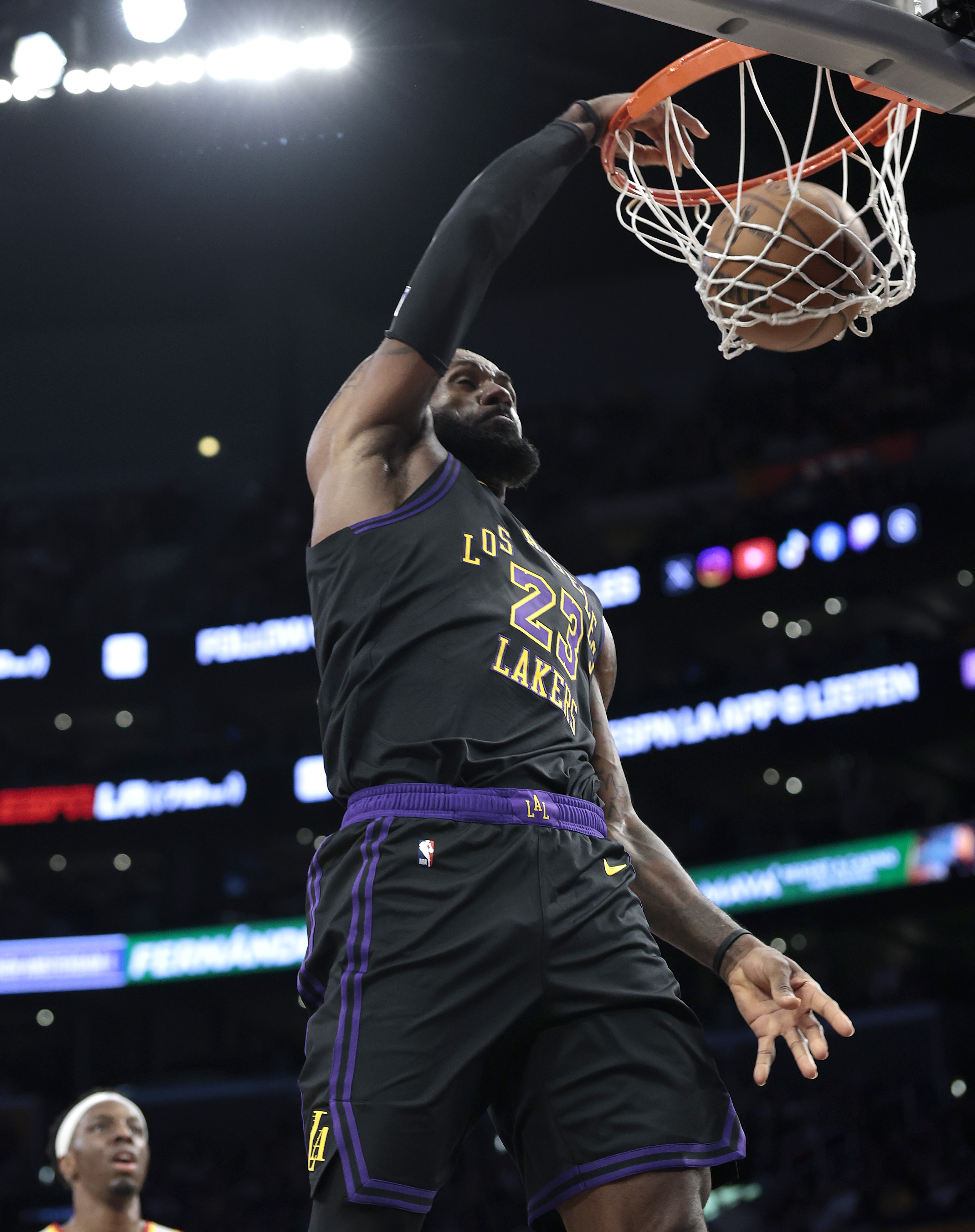 Lakers star LeBron James dunks during the second half of...