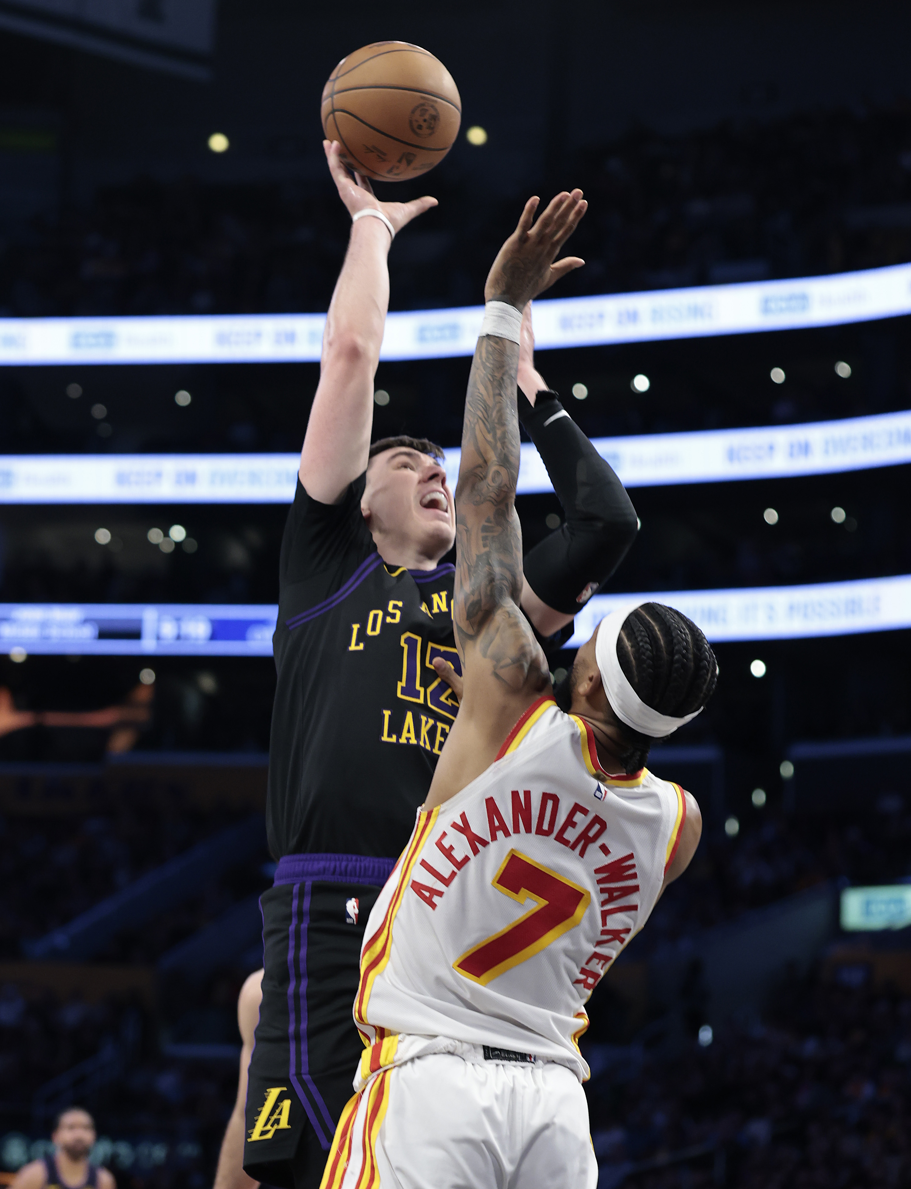 Lakers forward Jake LaRavia takes a shot as the Atlanta...