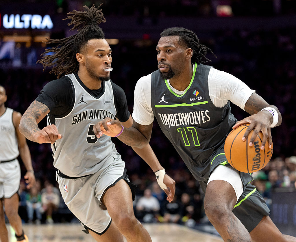 MINNEAPOLIS, MN. - JANUARY 2026: Minnesota Timberwolves forward Naz Reid (11) is guarded by San Antonio's Stephon Castle (5) at Target Center in Minneapolis, Minn., on Sunday, January 11, 2026. Minnesota Timberwolves vs. San Antonio Spurs. (Photo by Carlos Gonzalez/The Minnesota Star Tribune via Getty Images)e.com
