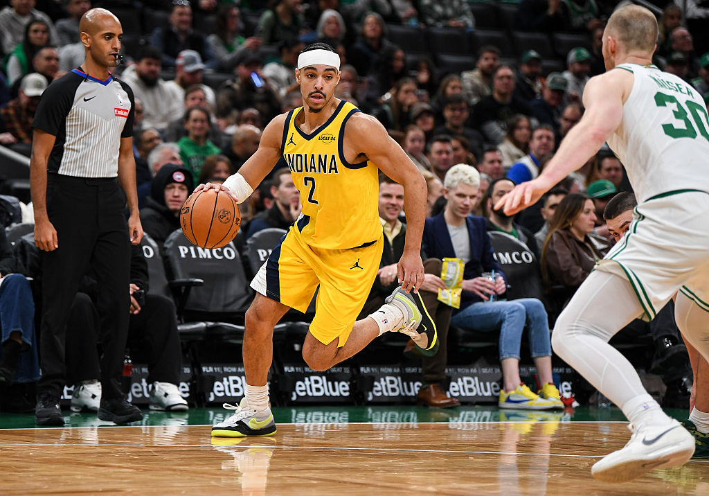 BOSTON, MASSACHUSETTS - JANUARY 21: Andrew Nembhard #2 of the Indiana Pacers dribbles the ball against Sam Hauser #30 of the Boston Celtics during the second half at TD Garden on January 21, 2026 in Boston, Massachusetts. NOTE TO USER: User expressly acknowledges and agrees that, by downloading and or using this photograph, User is consenting to the terms and conditions of the Getty Images License Agreement. (Photo by China Wong/Getty Images)