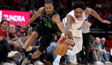 HOUSTON, TEXAS - JANUARY 18: Trey Murphy III #25 of the New Orleans Pelicans battles with Amen Thompson #1 of the Houston Rockets for a loose ball in the second half at Toyota Center on January 18, 2026 in Houston, Texas. NOTE TO USER: User expressly acknowledges and agrees that, by downloading and or using this photograph, User is consenting to the terms and conditions of the Getty Images License Agreement. (Photo by Tim Warner/Getty Images)