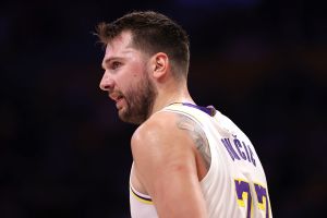 LOS ANGELES, CALIFORNIA - JANUARY 18: Luka Doncic #77 of the Los Angeles Lakers looks on during the first quarter against the Toronto Raptors at Crypto.com Arena on January 18, 2026 in Los Angeles, California. The Los Angeles Lakers defeated the Toronto Raptors 110-93. NOTE TO USER: User expressly acknowledges and agrees that, by downloading and or using this photograph, User is consenting to the terms and conditions of the Getty Images License Agreement. (Photo by Katelyn Mulcahy/Getty Images)