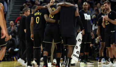 Warriors’ Jimmy Butler helped off after suffering knee injury in win over Heat