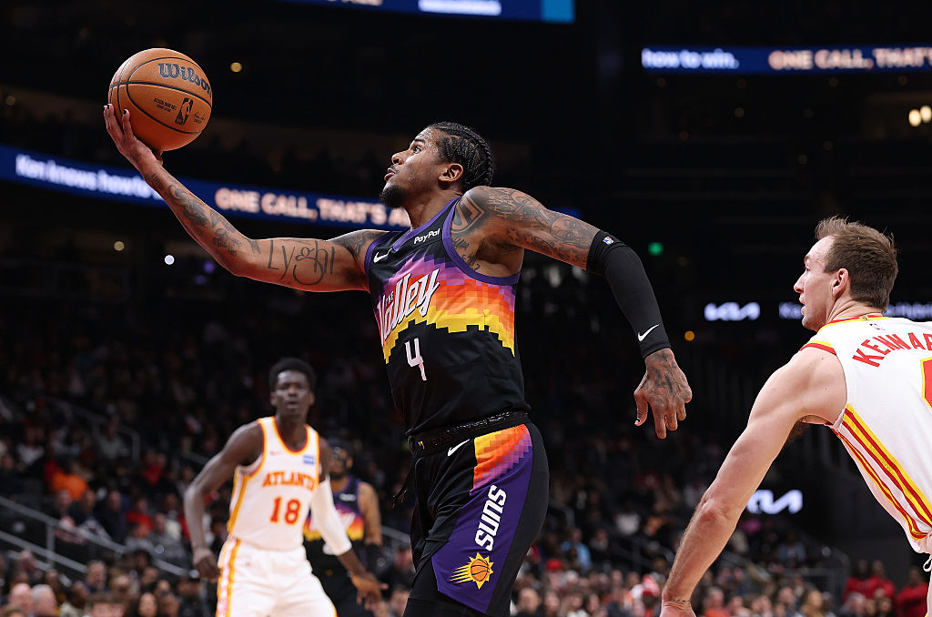 ATLANTA, GEORGIA - JANUARY 23: Jalen Green #4 of the Phoenix Suns drives against Luke Kennard #4 of the Atlanta Hawks during the first quarter at State Farm Arena on January 23, 2026 in Atlanta, Georgia. NOTE TO USER: User expressly acknowledges and agrees that, by downloading and or using this photograph, User is consenting to the terms and conditions of the Getty Images License Agreement. (Photo by Kevin C. Cox/Getty Images)