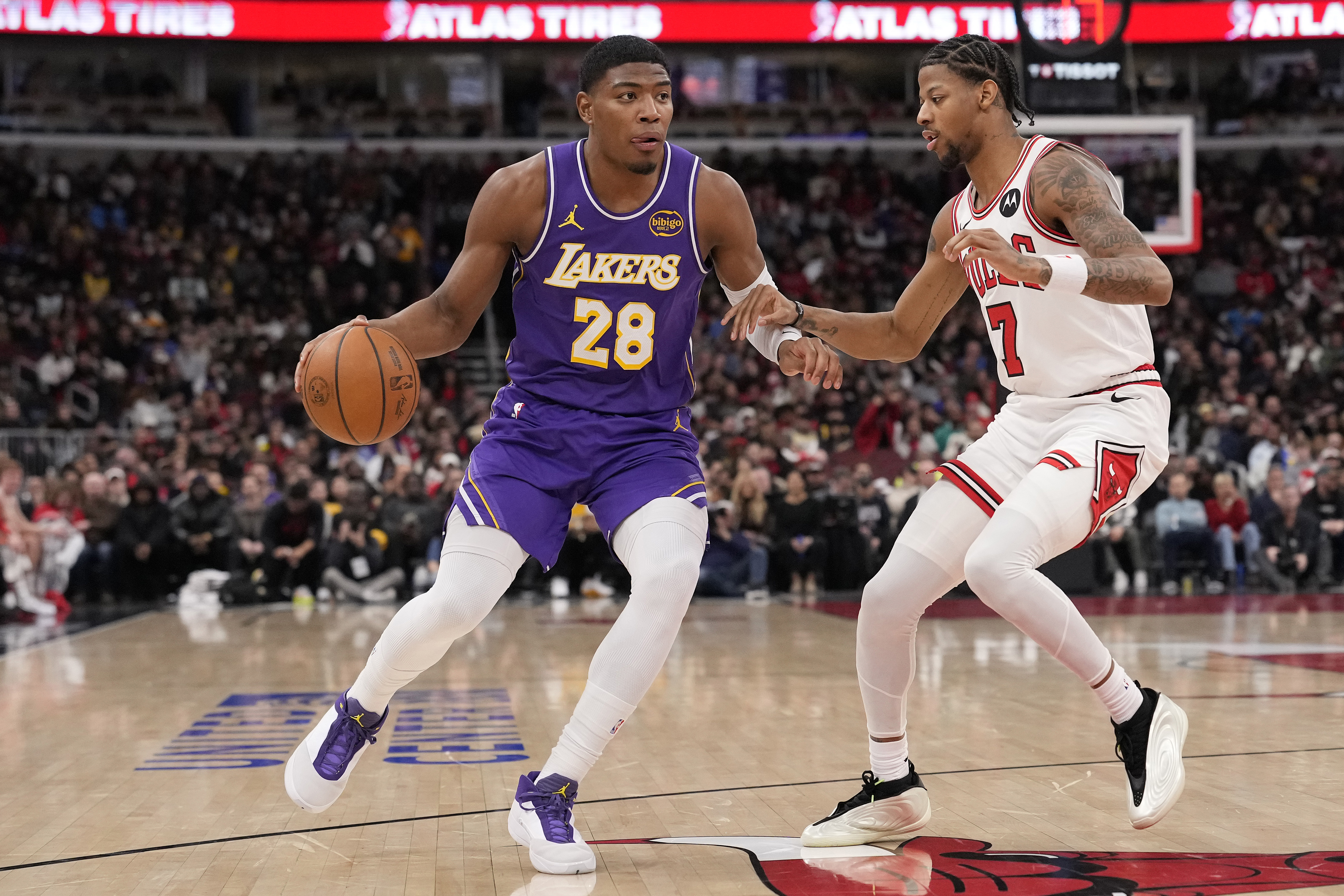 Lakers forward Rui Hachimura drives as the Chicago Bulls’ Dalen...