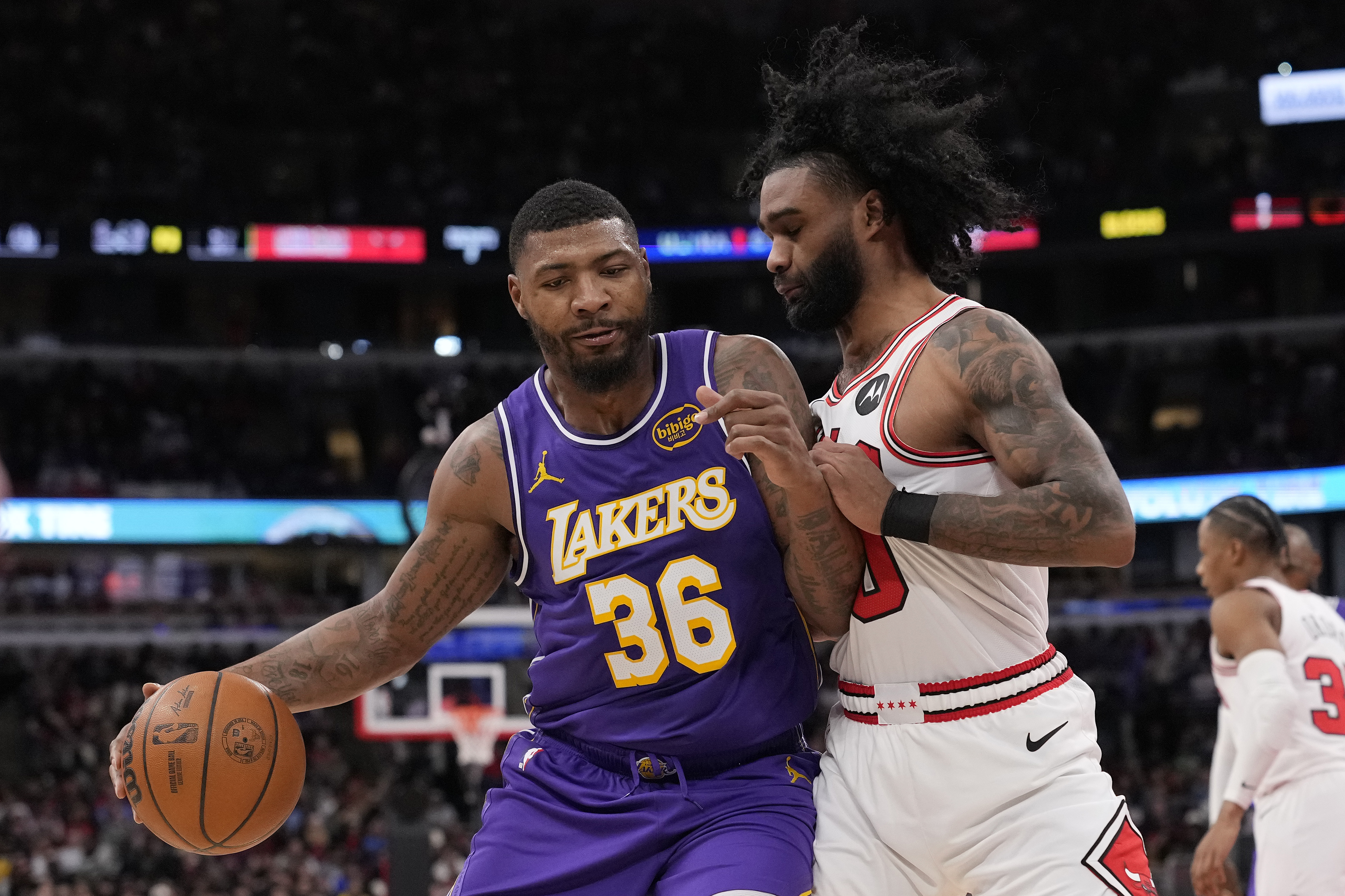 Lakers guard Marcus Smart posts up against the Chicago Bulls’...