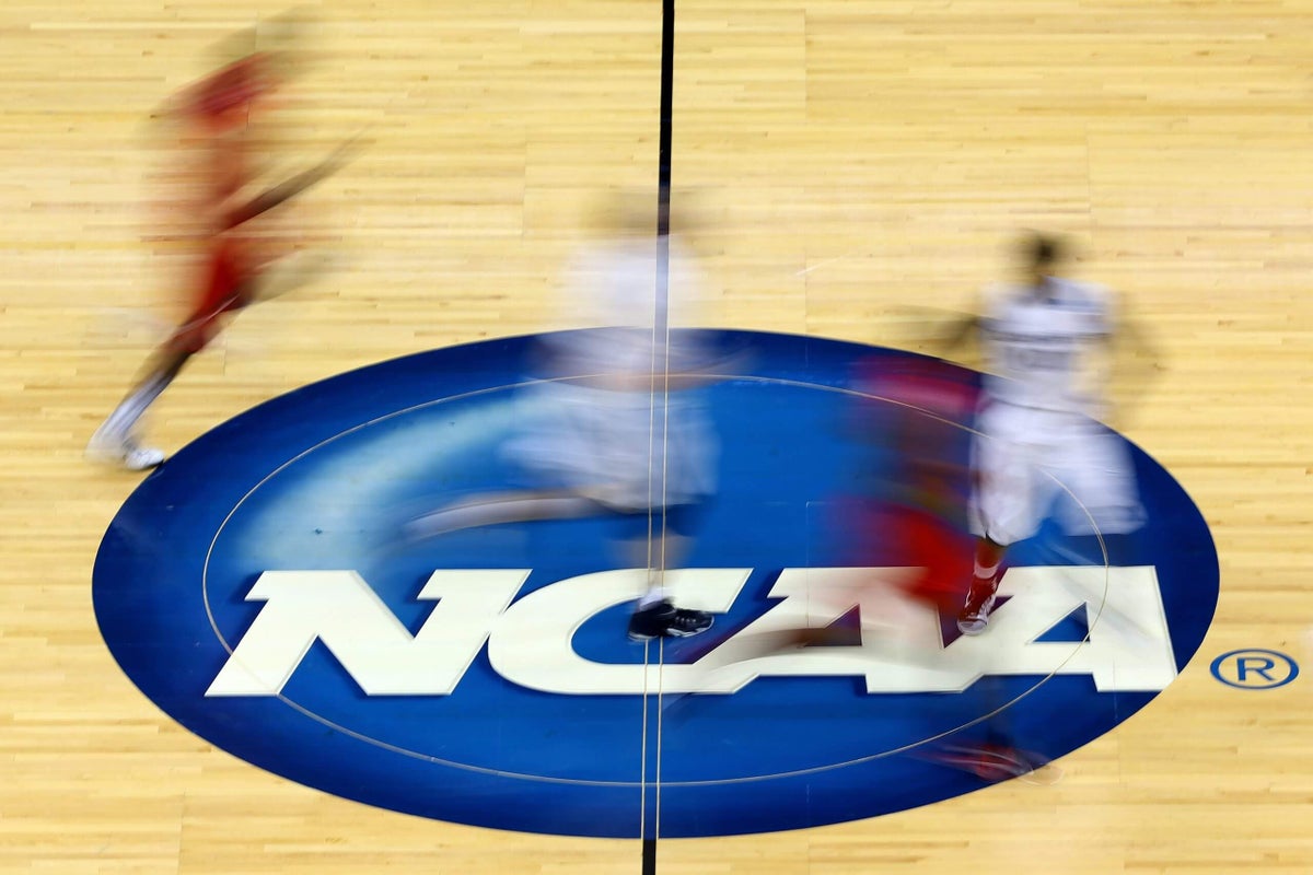 Who are the 20 college basketball players charged in the federal point-shaving case?