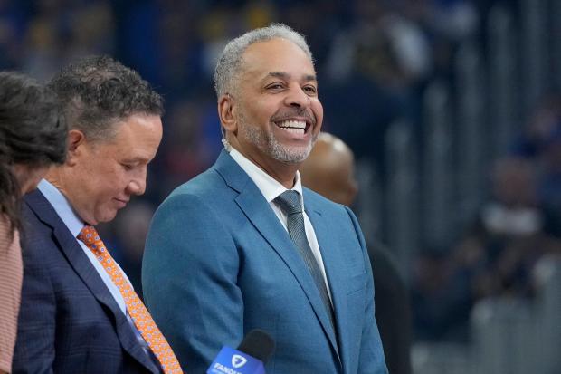 FILE - Dell Curry attends an NBA basketball game between the Golden State Warriors and the Charlotte Hornets in San Francisco, Tuesday, Feb. 25, 2025. (AP Photo/Jeff Chiu, File)
