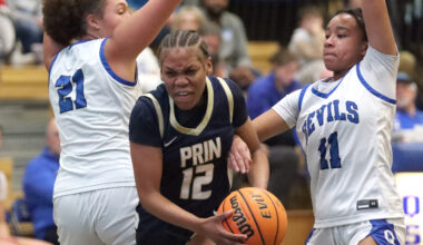 Photo gallery: QHS boys, girls basketball teams suffer losses in Quincy Shootout