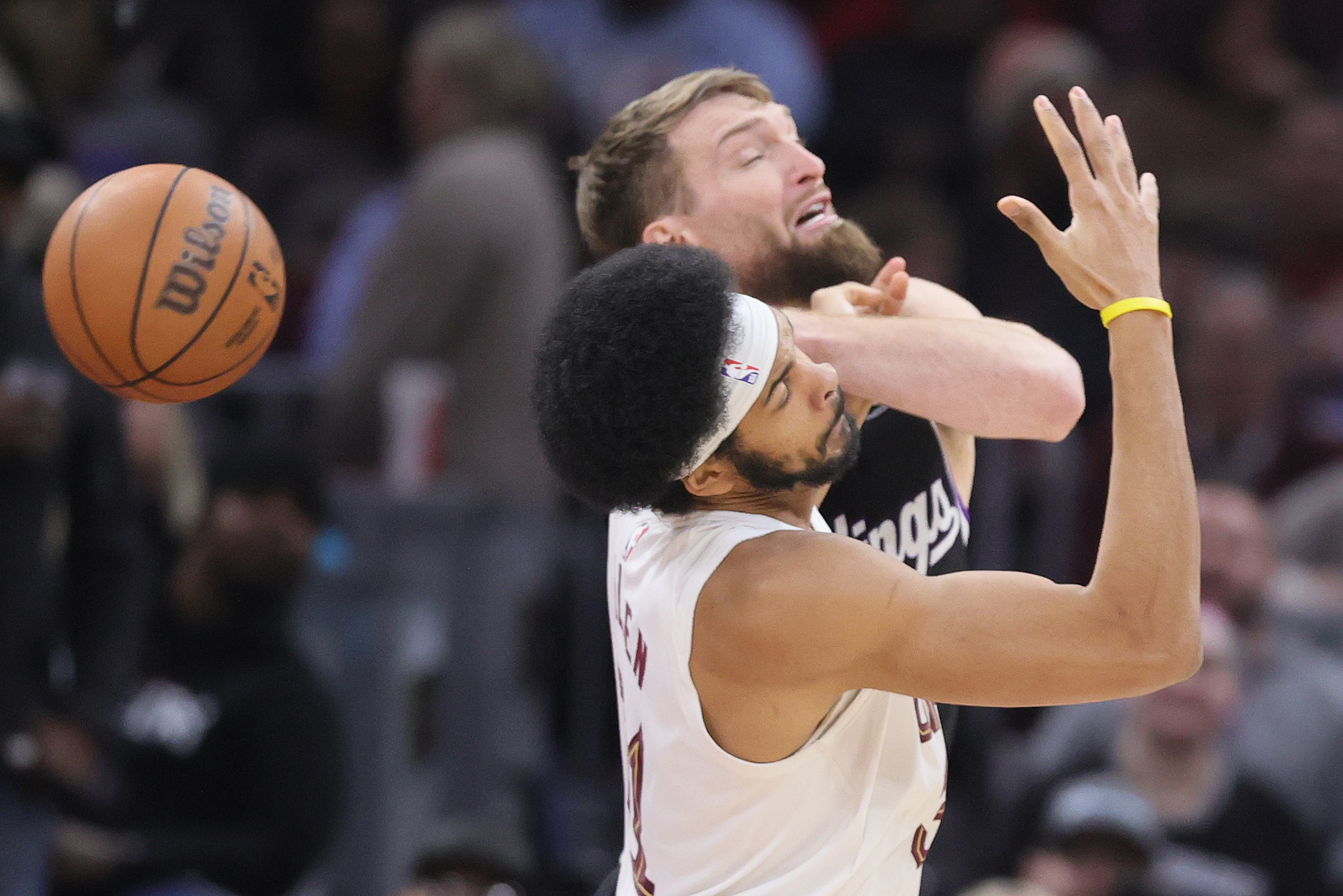 Cleveland Cavaliers center Jarrett Allen (front) and Sacramento Kings forward Domantas Sabonis battle for possession of a rebound in the second half. 