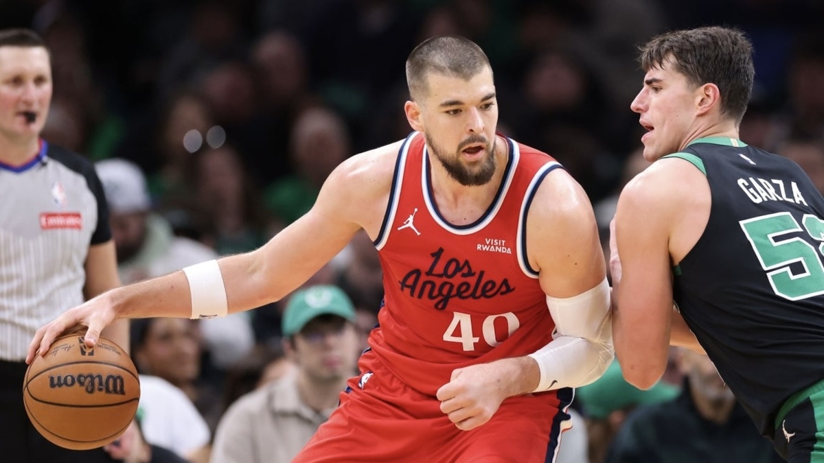 Boston Celtics forward Luka Garza (52) defends Los Angeles Clippers center Ivica Zubac (40) during the first half at TD Garden.
