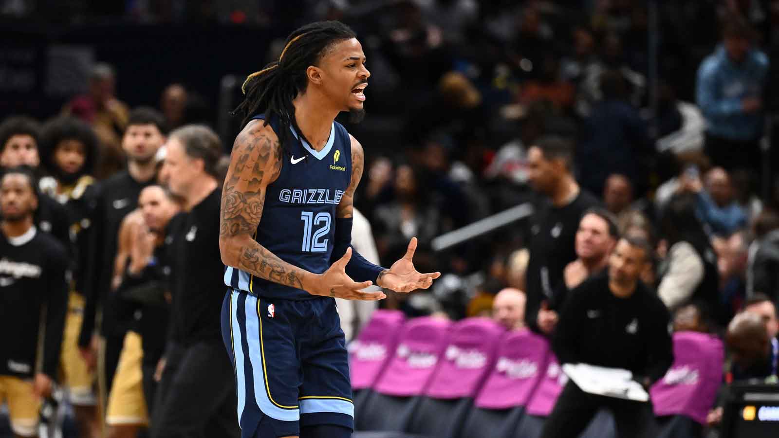 Memphis Grizzlies guard Ja Morant (12) reacts after a three point shot against the Washington Wizards during the second half at Capital One Arena. 