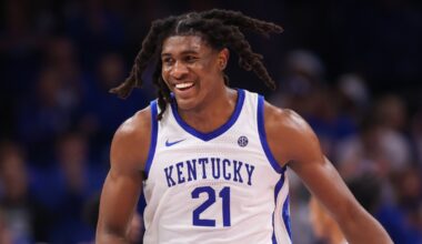 Kentucky's middle blocker Jordyn Dailey (5) celebrates with Eva Hudson (7) and Lizzie Carr (15) against Cal Poly Thursday in Historic Memorial Coliseum. Dec. 11, 2025