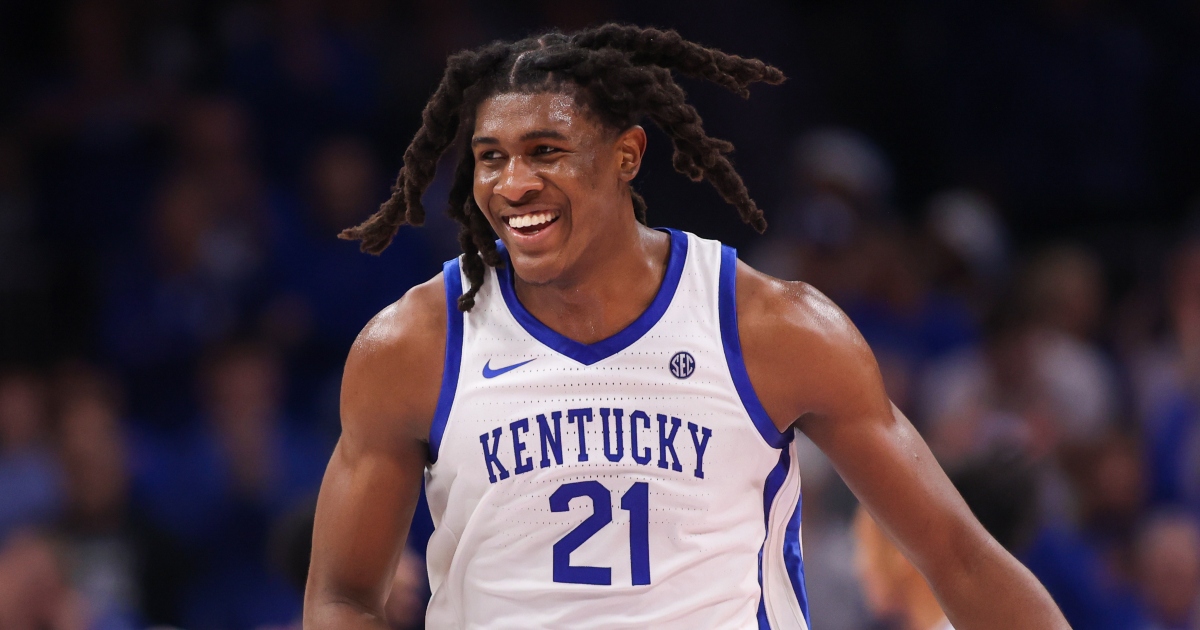 Kentucky's middle blocker Jordyn Dailey (5) celebrates with Eva Hudson (7) and Lizzie Carr (15) against Cal Poly Thursday in Historic Memorial Coliseum. Dec. 11, 2025