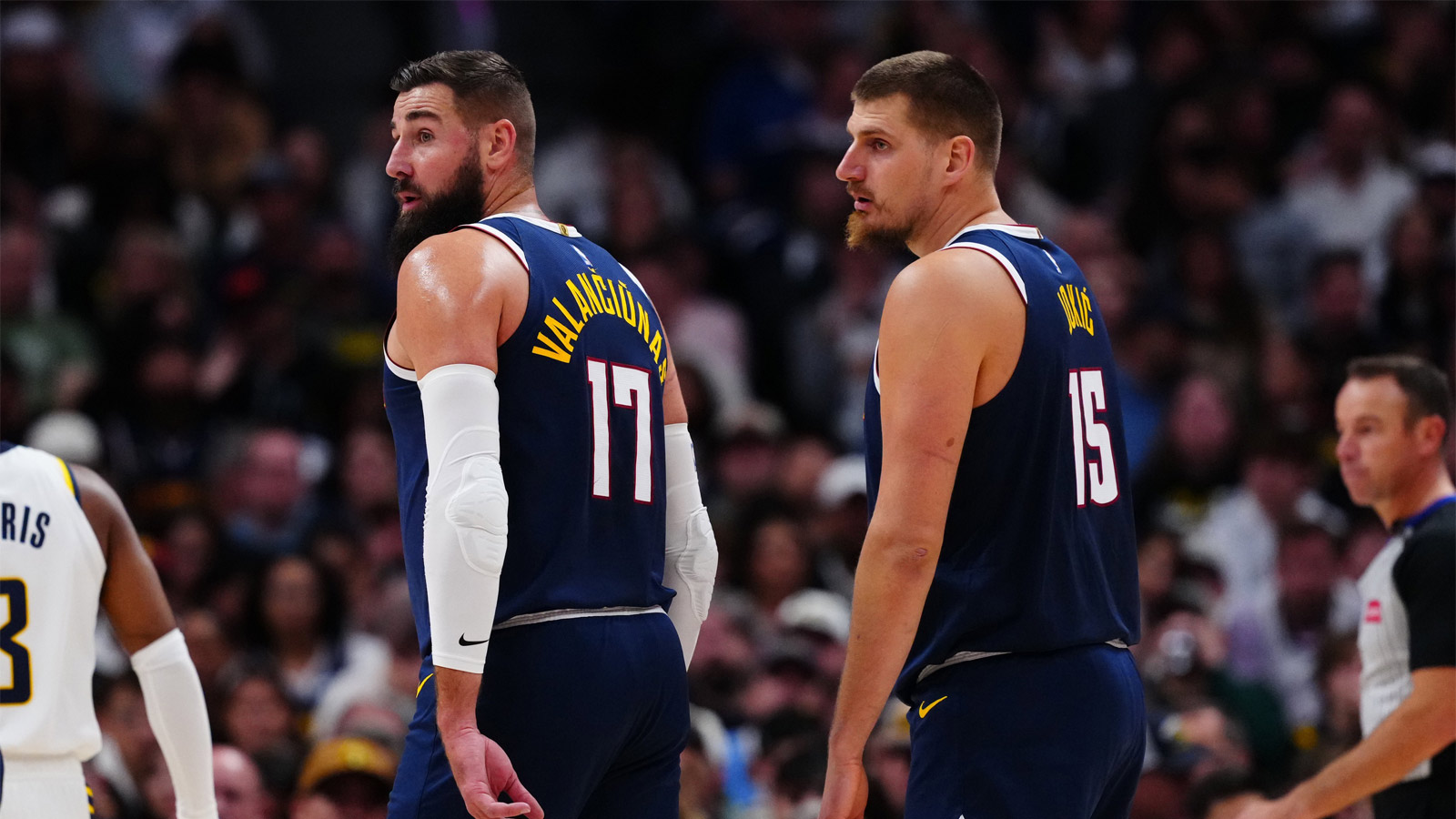 Denver Nuggets center Jonas Valanciunas (17) and center Nikola Jokic (15) on the court in the second half against the Indiana Pacers at Ball Arena. 