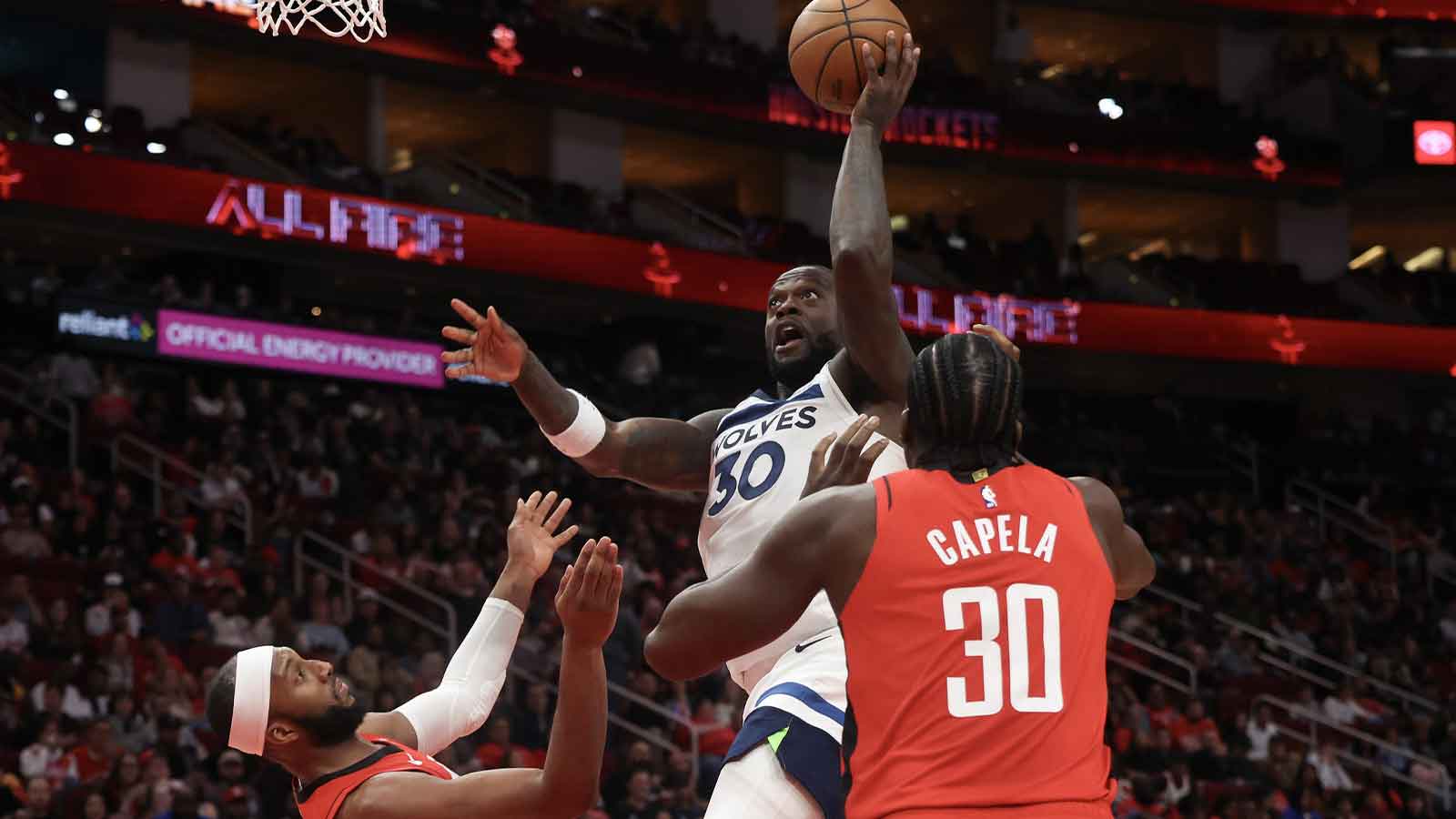Minnesota Timberwolves forward Julius Randle (30) drives to the net against Houston Rockets guard Josh Okogie (20) in the second quarter at Toyota Center.