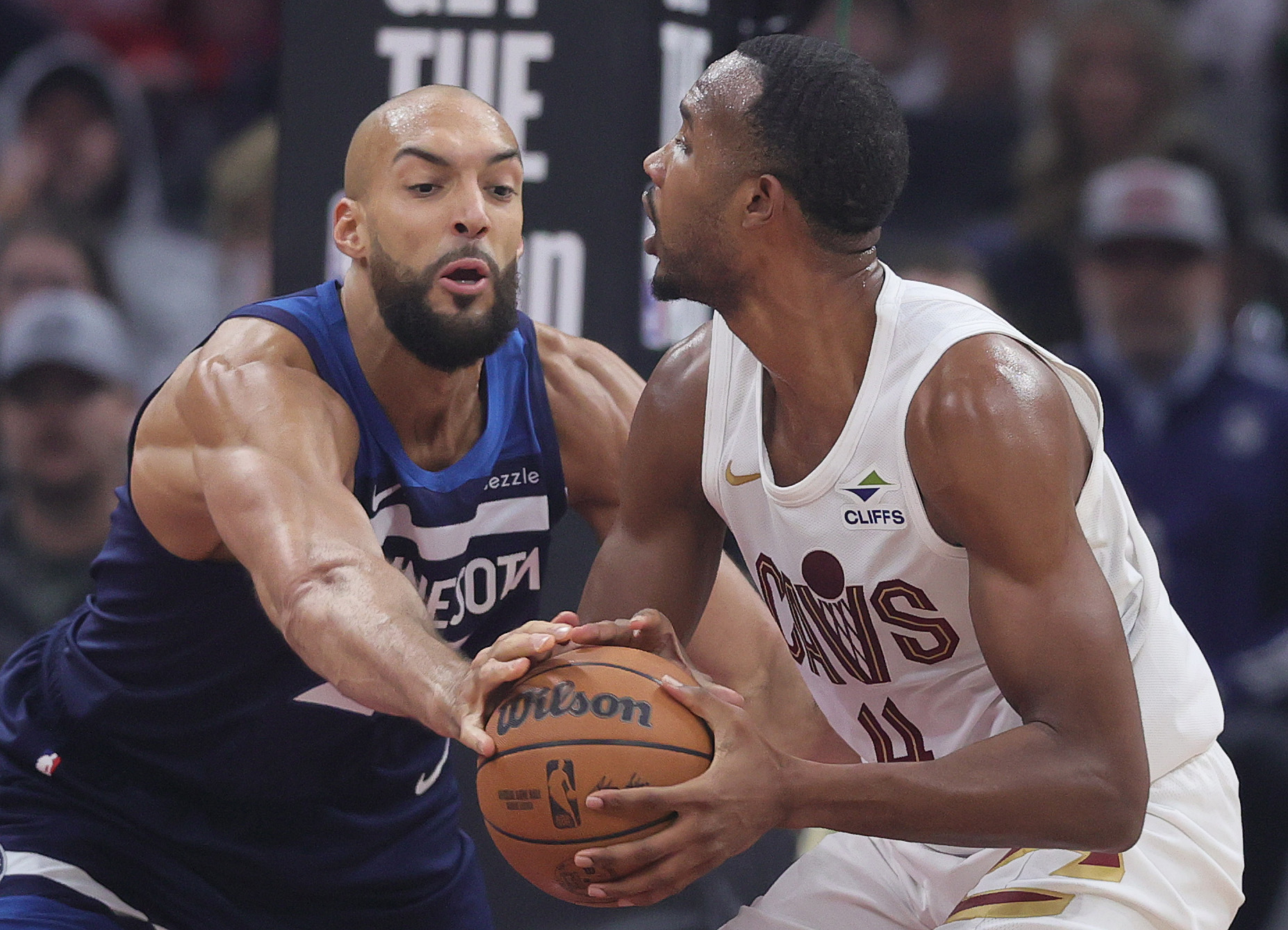 Minnesota Timberwolves center Rudy Gobert tries for the steal on Cleveland Cavaliers center Evan Mobley in the first half at Rocket Arena. 