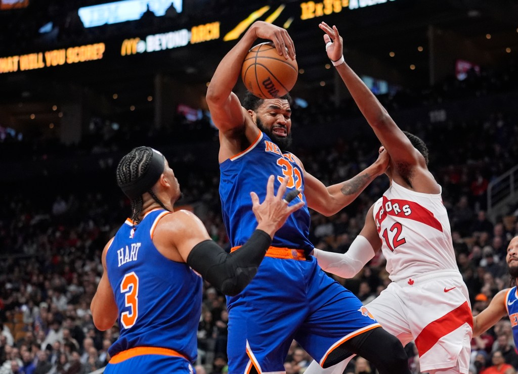 Karl-Anthony Towns grabs one of his season-high 22 rebounds during the Knicks' 119-92 blowout win over the Raptors on Jan. 28, 2026 in Toronto.