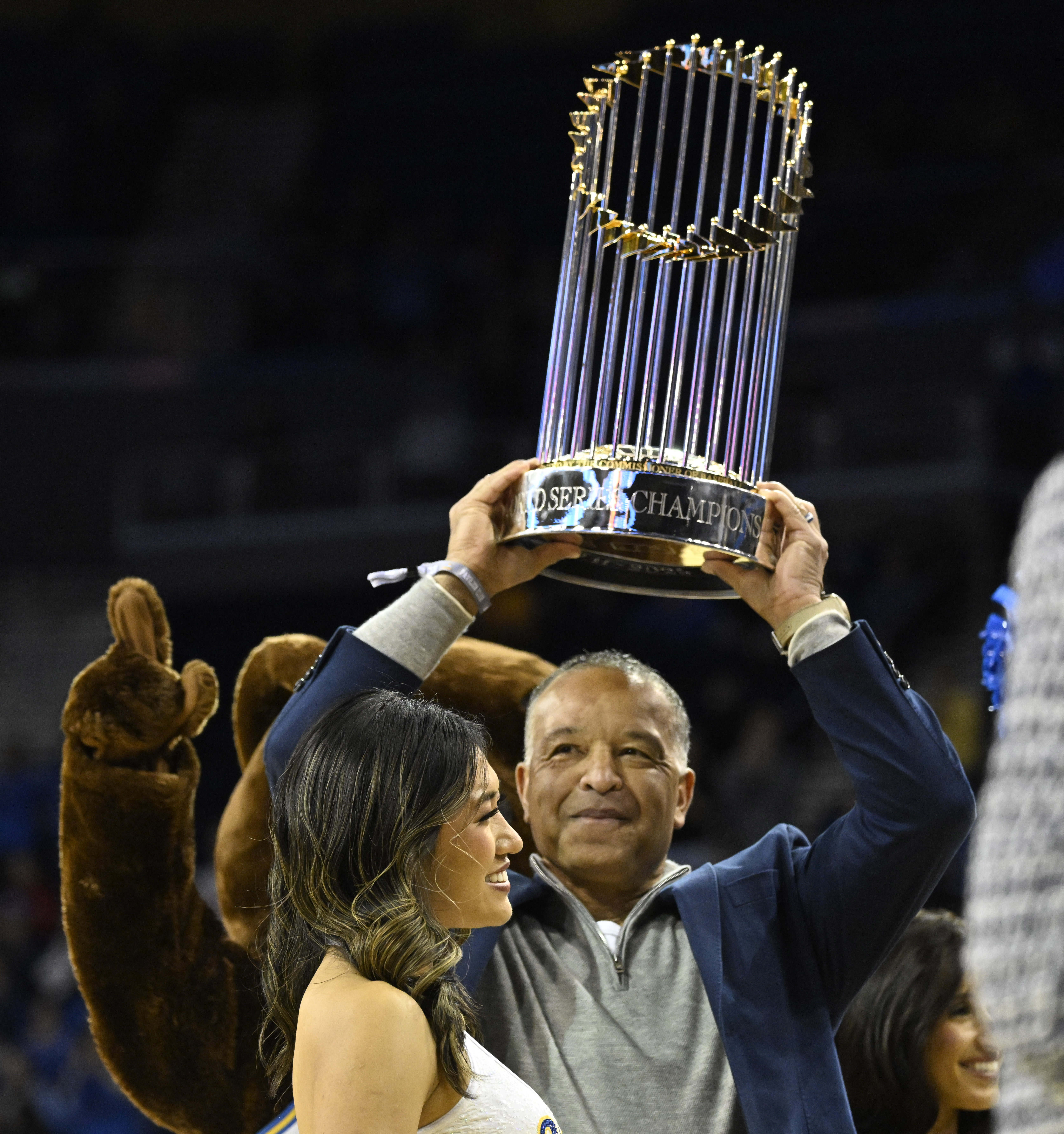 Los Angeles Dodgers manager Dave Roberts and former UCLA Bruins...