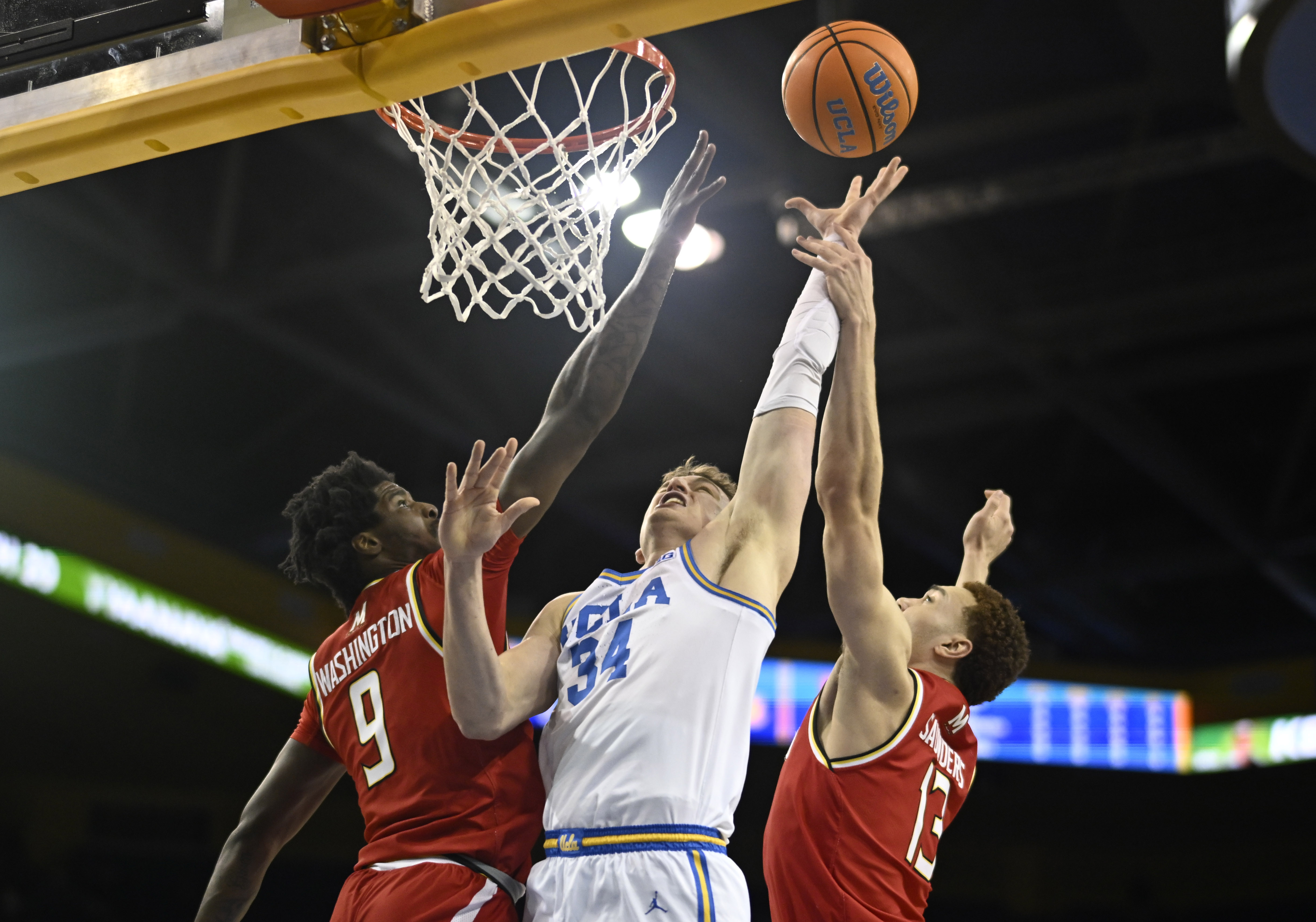 Forward Tyler Bilodeau #34 of the UCLA Bruins drives to...