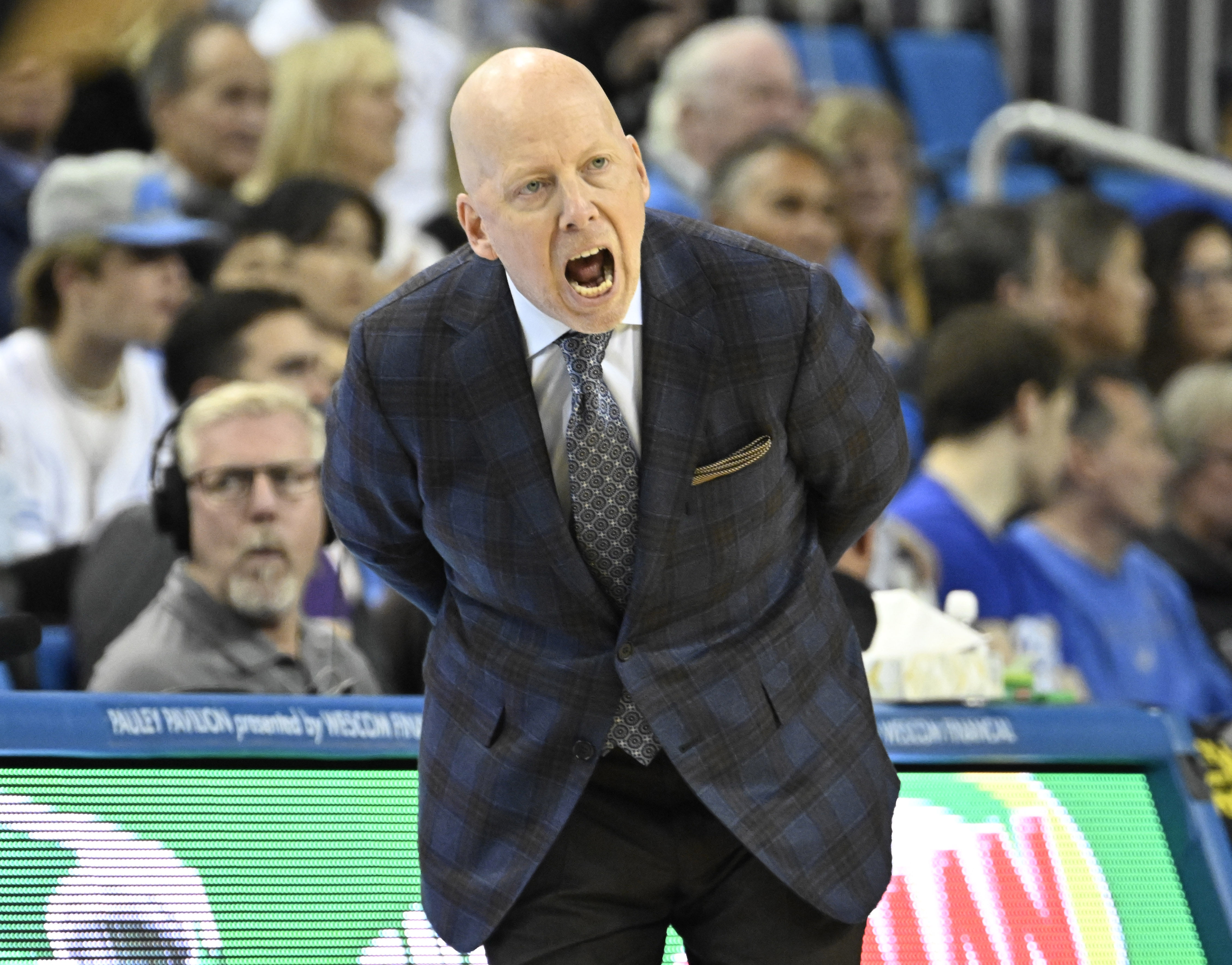 Head coach Mick Cronin of the UCLA Bruins reacts against...