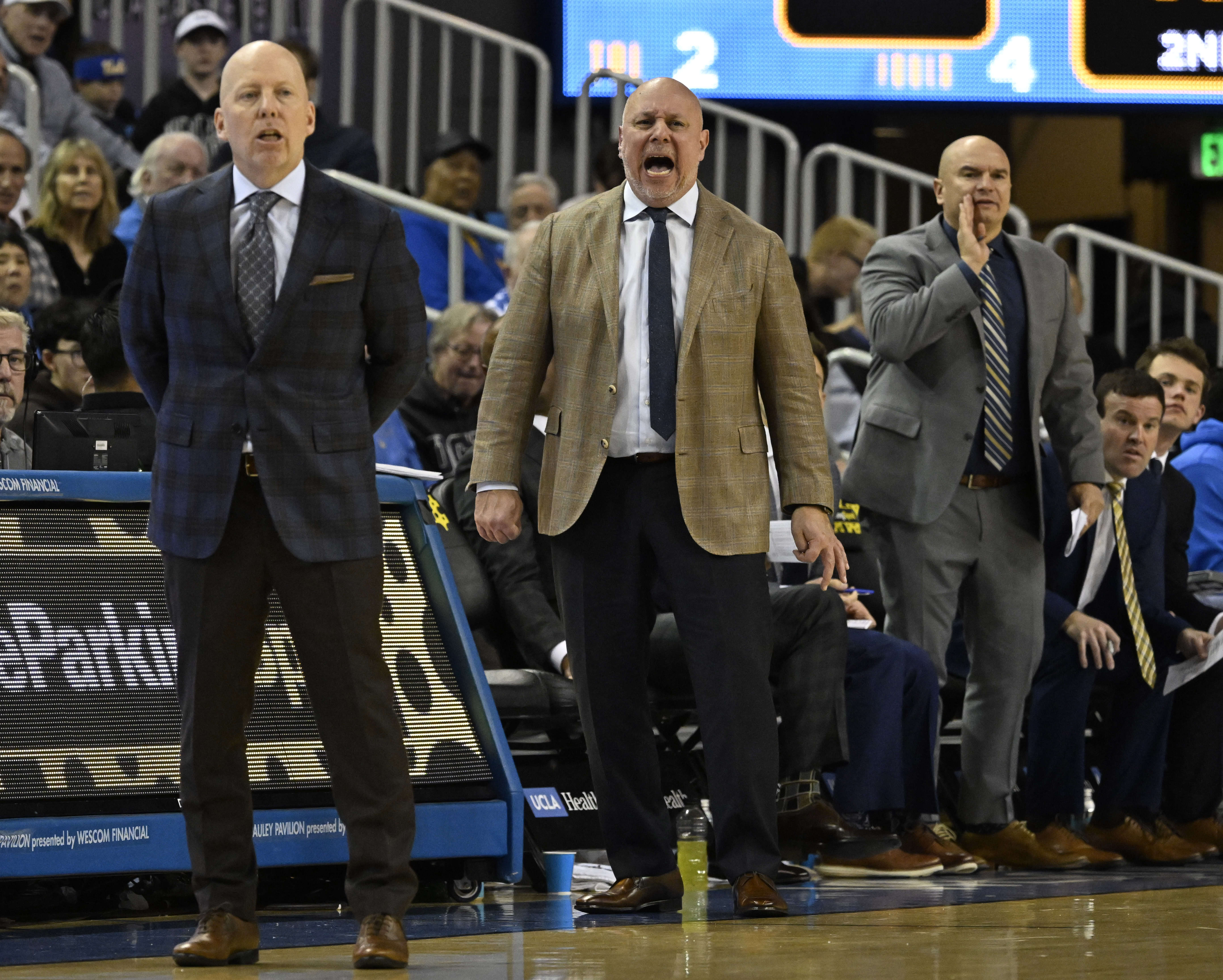 Head coach Mick Cronin, left, along with Associate Head Coach,...