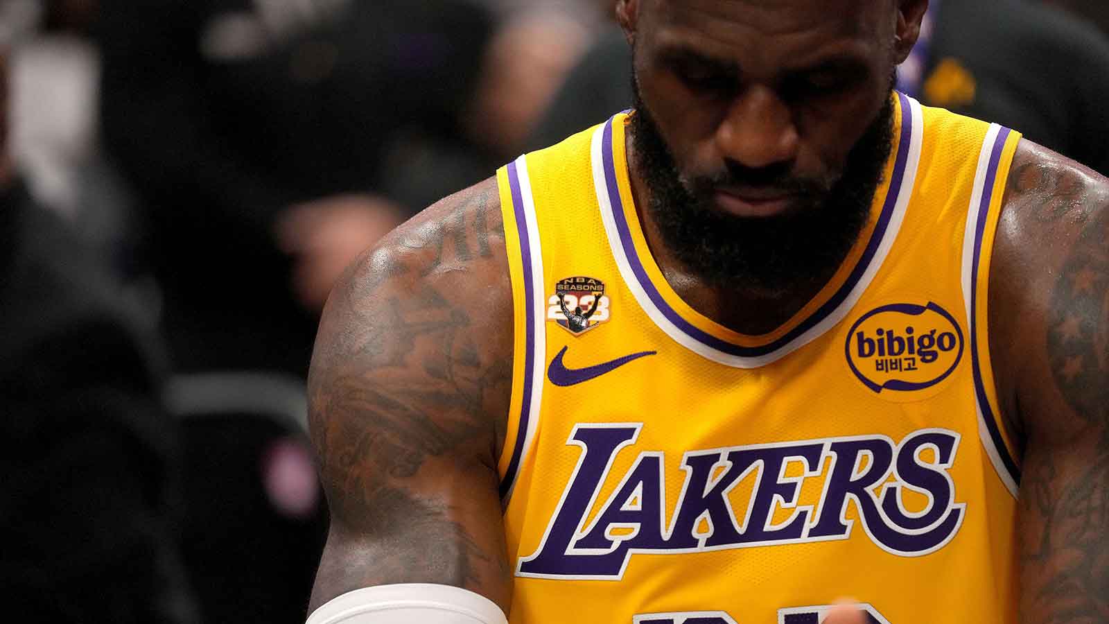 Los Angeles Lakers forward LeBron James (23) sits on the bench during a timeout against the Sacramento Kings in the second quarter at the Golden 1 Center.
