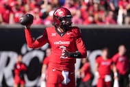 Cincinnati's Brendan Sorsby throws during the first half of an NCAA college football game...