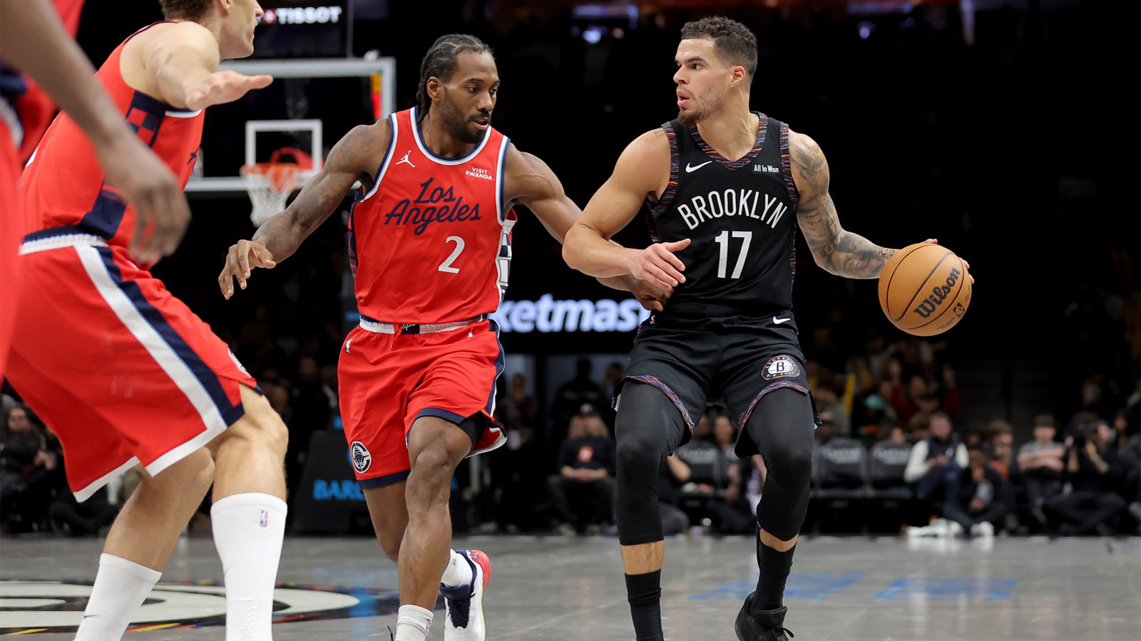Jan 9, 2026; Brooklyn, New York, USA; Brooklyn Nets forward Michael Porter Jr. (17) controls the ball against Los Angeles Clippers forward Kawhi Leonard (2) during the third quarter at Barclays Center. Mandatory Credit: Brad Penner-Imagn Images
