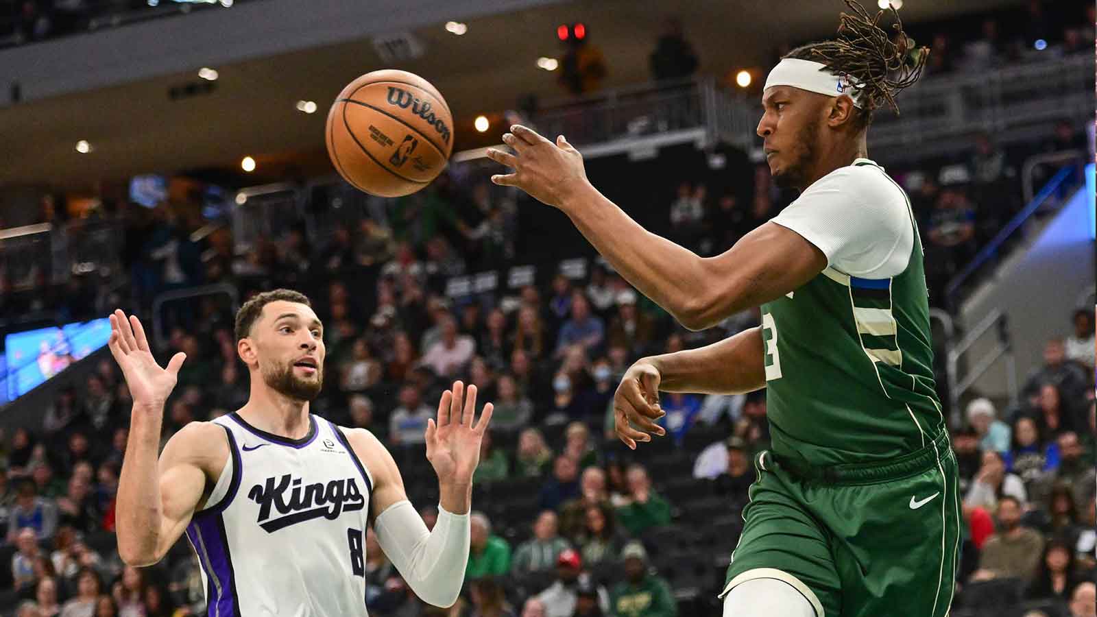 Milwaukee Bucks center Myles Turner (3) passes against Sacramento Kings guard Zach LaVine (8) in the second quarter at Fiserv Forum.