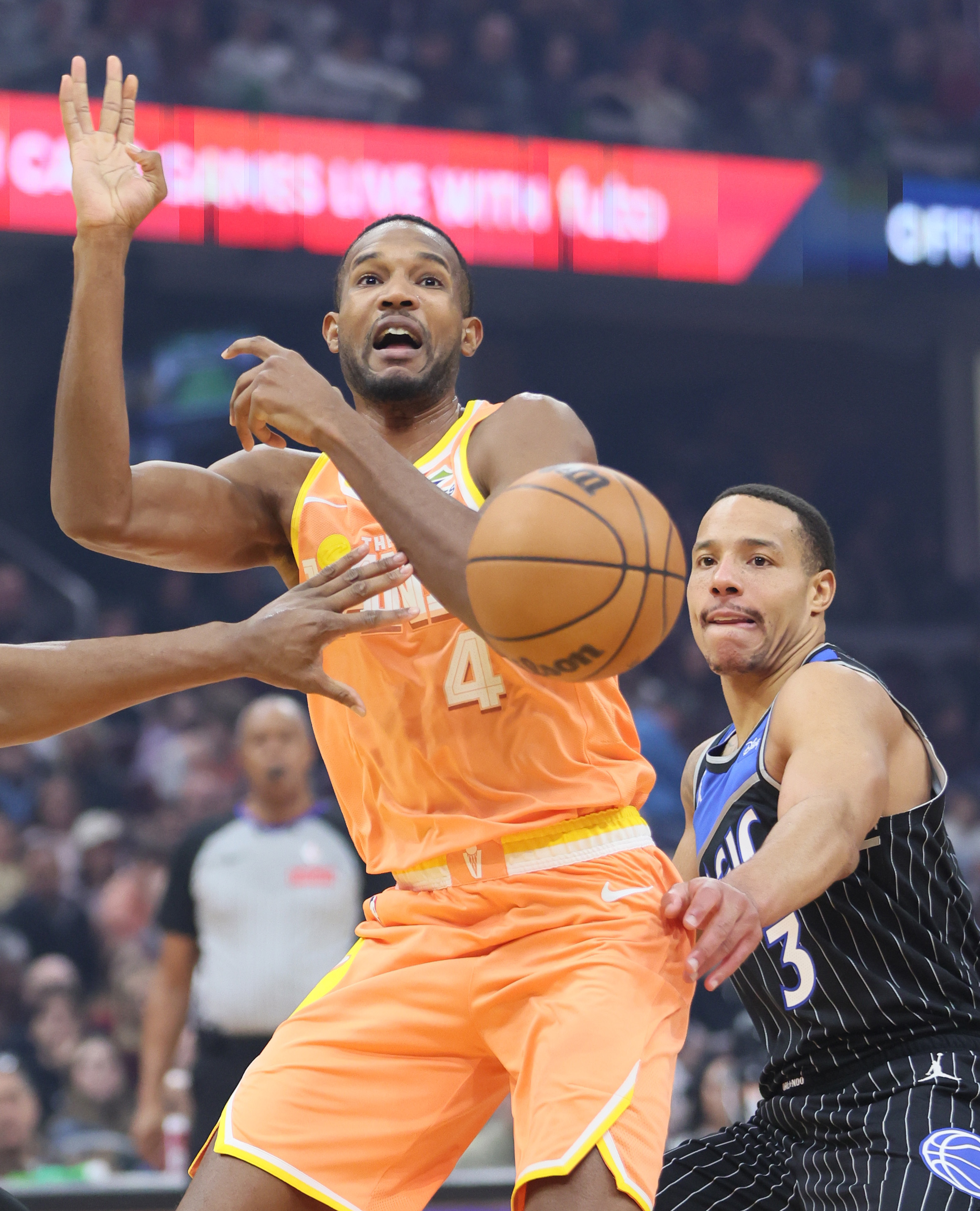 Cleveland Cavaliers center Evan Mobley has the basketball stripped from his hands by Orlando Magic guard Desmond Bane (R) for a turnover in the first half at Rocket Arena. 
