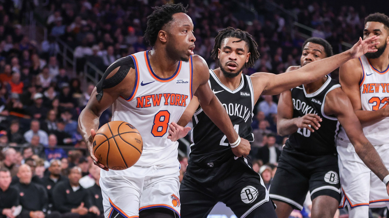 New York Knicks forward Og Anunoby (8) drives past Brooklyn Nets guard Cam Thomas (24) in the second quarter at Madison Square Garden.