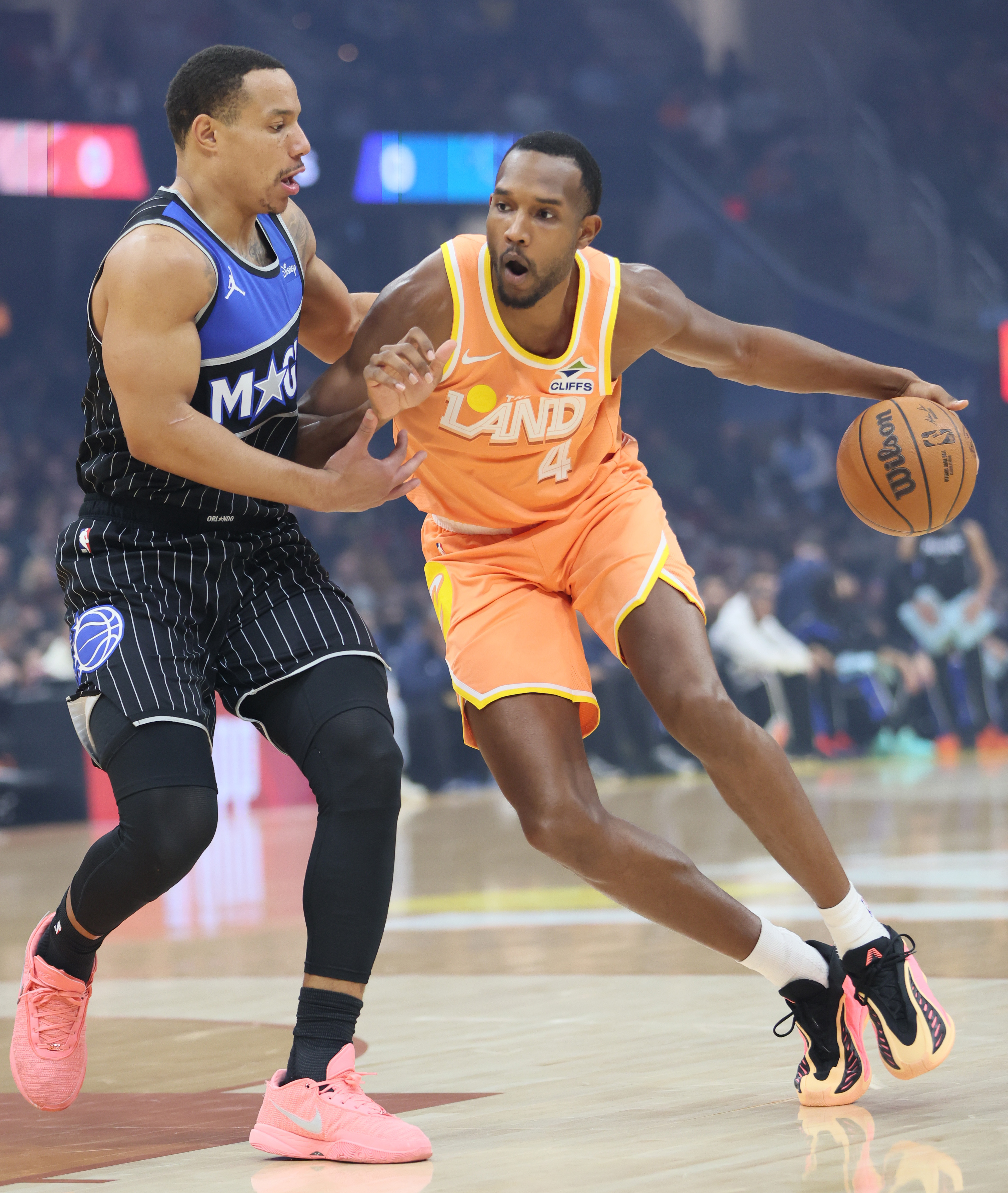 Cleveland Cavaliers center Evan Mobley drives towards the basket guarded by Orlando Magic guard Desmond Bane in the first half at Rocket Arena. 