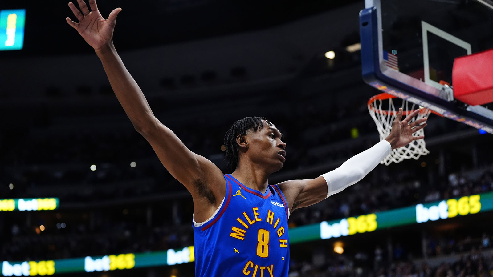 Denver Nuggets guard Peyton Watson (8) during the first quarter against the Charlotte Hornets at Ball Arena. 